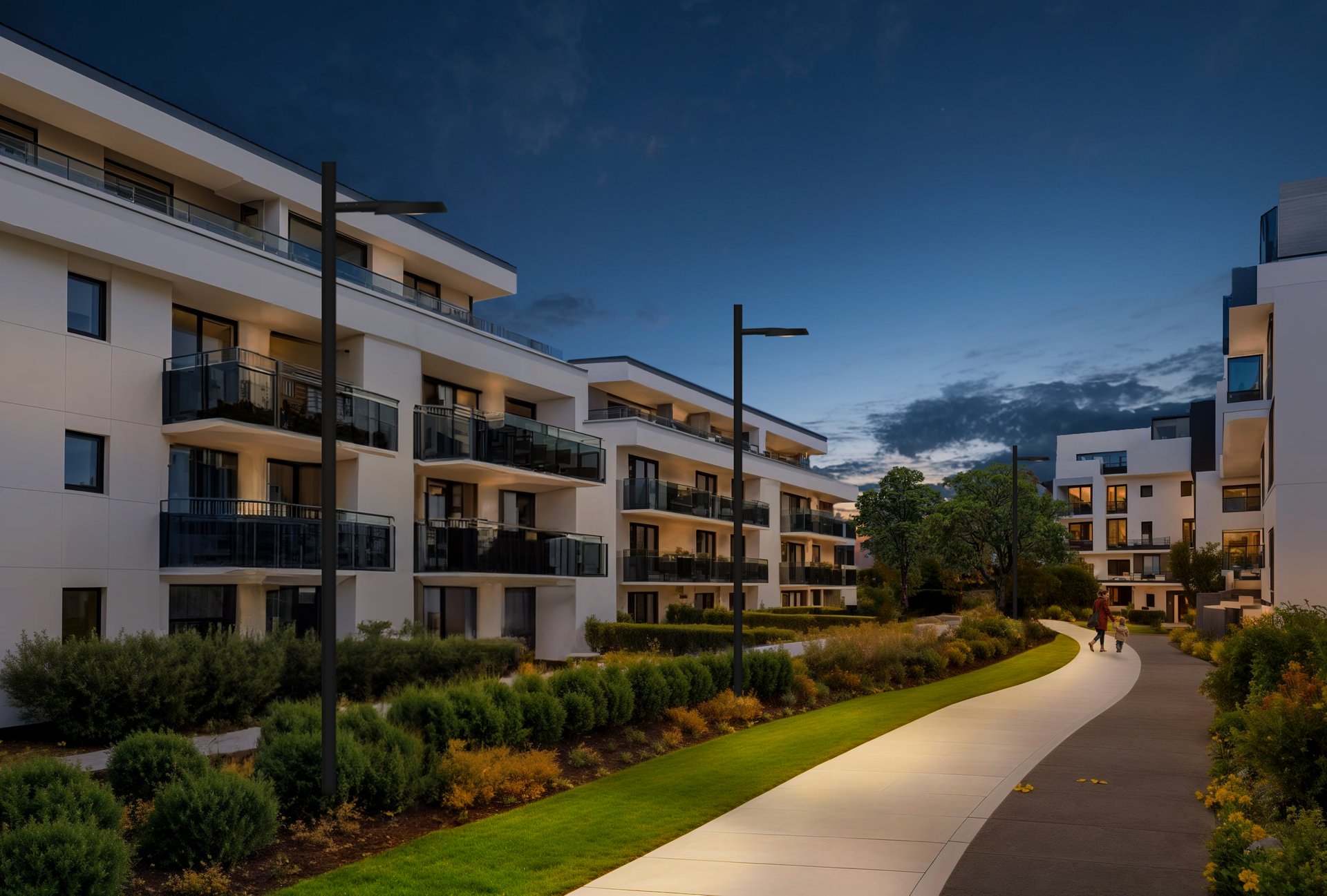 Modern residential development with LED pathway lighting illuminating curved walkway at dusk